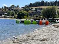 The tranquil lakeside of Wanaka Roy Bay.