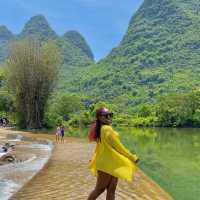 Bamboo boat rafting along Yulong river 