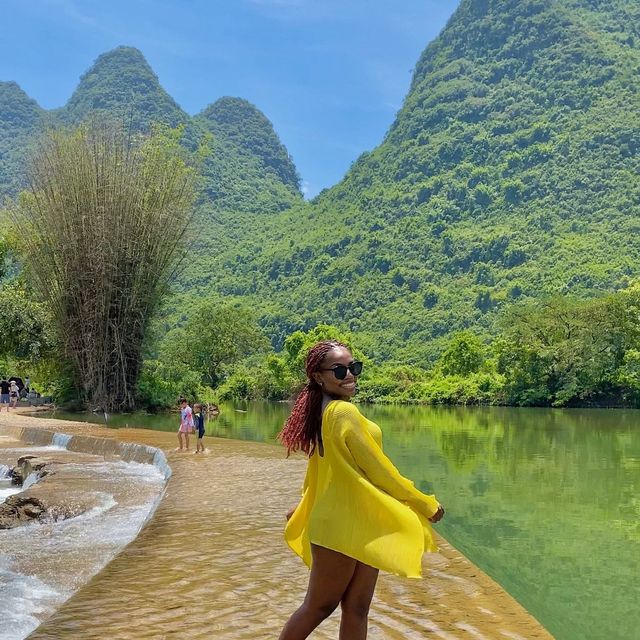 Bamboo boat rafting along Yulong river 