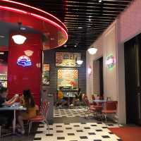 Eating comfort food in a car at Macau Studio City 