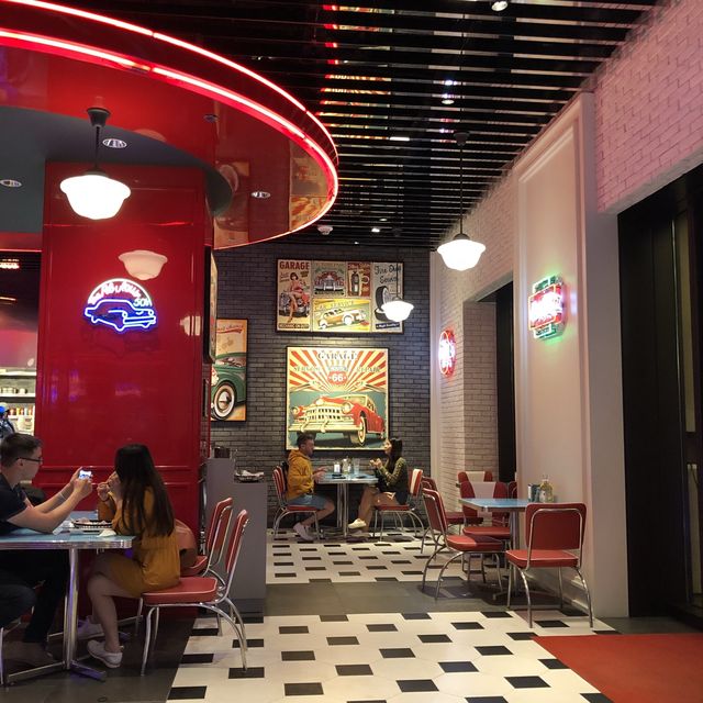 Eating comfort food in a car at Macau Studio City 