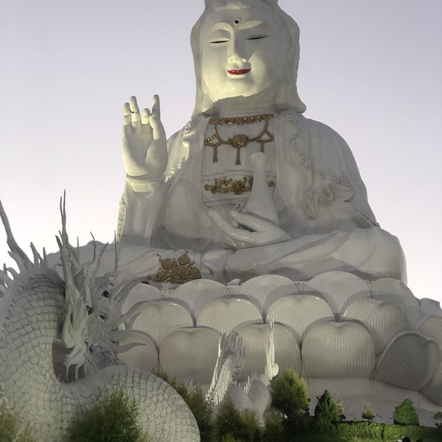 huge white Buddha with 9 floor pagoda 