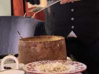 Fancy Italian Cuisine With Excellent Cheese Wheel Dish