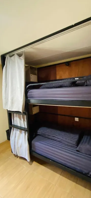 เตียงในห้องพักรวมชายหญิง 4 เตียง