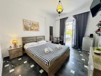 Tritonas Rooms - Inns