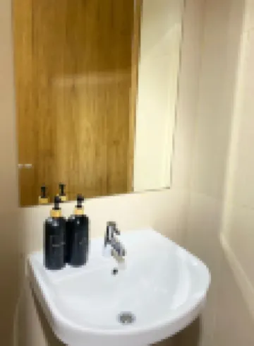 Cozy Studio at Gateway Park LRT City Jatibening Apartment by Travelio