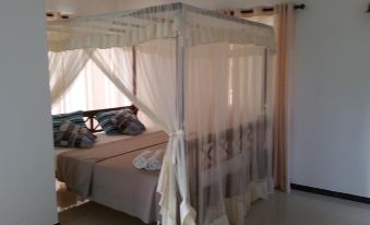 Coral Palm Villa and Apartment