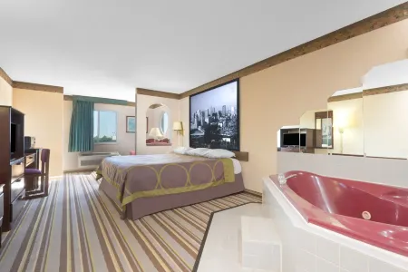 Super 8 by Wyndham Wapakoneta Отели в г. Оглейз