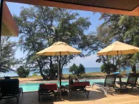 Coriacea Beachfront Boutique Phuket Resort Hôtels à proximité de : Plage de Mai Khao
