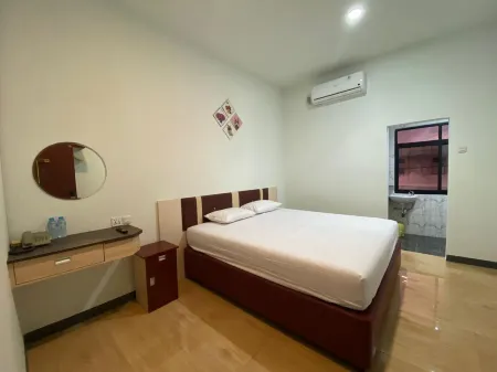 Hotel Berlian Отели в г. Benua Melayu Darat