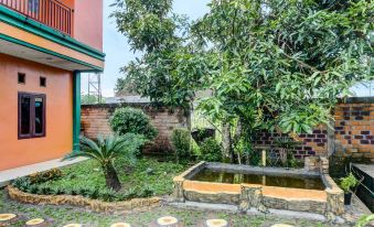 Capital O 92316 Wisma Widya Loka Pratama Near Futsal Tebing Gading