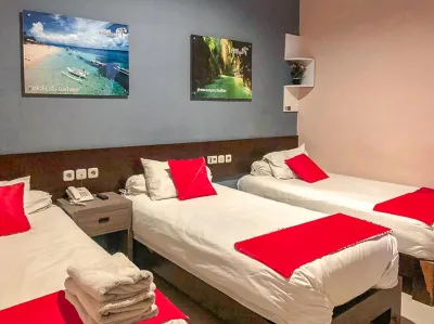 Audah Syariah Residence Mitra RedDoorz Hotels in Sawunggaling