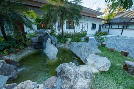 Kangban Resort Отели рядом с достопримечательностью «Singha Park Chiang Rai»