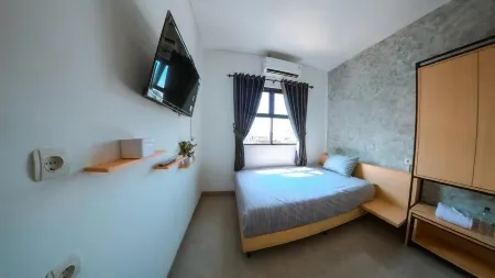 Arlita Guesthouse Отели рядом с достопримечательностью «Alun-Alun Cianjur»