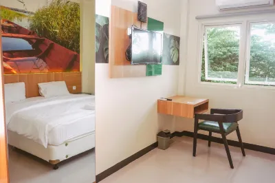 Greenhaus Inn Dinoyo Hotell i Keputran