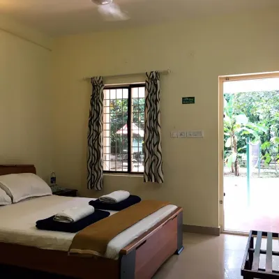 Palm Grove Service Villa โรงแรมใกล้โอเบรอน มอลล์