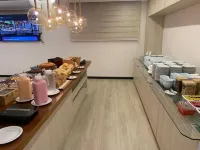 GoldMen Select Maringá - petit déjeuner