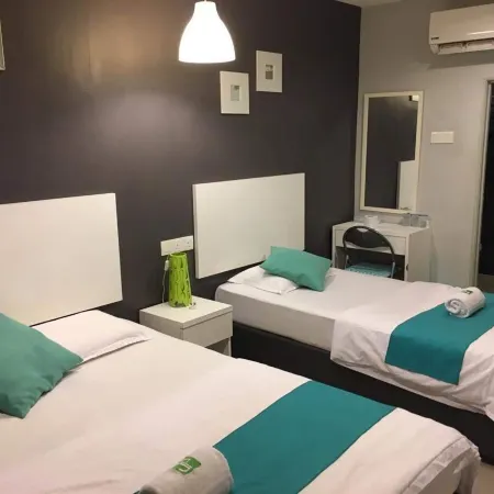 JP Hotel Jalan Stadium Отели рядом с достопримечательностью «Большая часовая башня»
