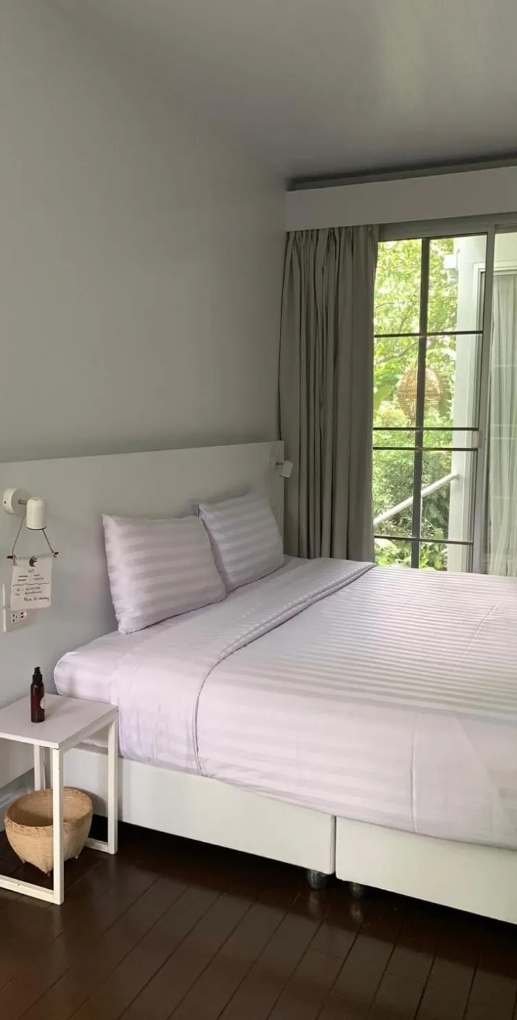 ห้องดีลักซ์สำหรับสามท่านพร้อมวิวสวน