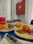 Le Petit Hotel - Desayuno
