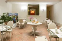 Hotel & Residenza 100 Torri - servizio colazione