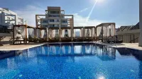 Olivia Palm Hotel - parkir