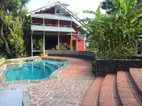 Coco Mango Suites Hotels in Calibishie