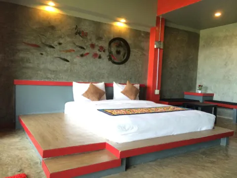 ห้องดีลักซ์พร้อมเครื่องปรับอากาศ เตียงคิงไซส์