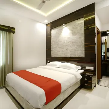 SS Crown Inn Hotels near Krantivira Sangolli Rayanna-Railway Station