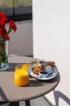 Great White Hotel - servizio colazione