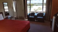 Palm Court Motel فنادق في Hangatiki