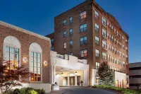 Collegian Hotel & Suites, Trademark Collection by Wyndham Hotels near Martin J. Whitman School of Management at Syracuse University