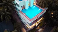 Passiflora Beach Resort Alibaug - de playa
