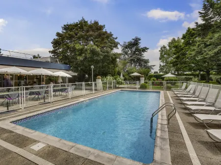Novotel Poissy Orgeval Отели в г. Оржваль