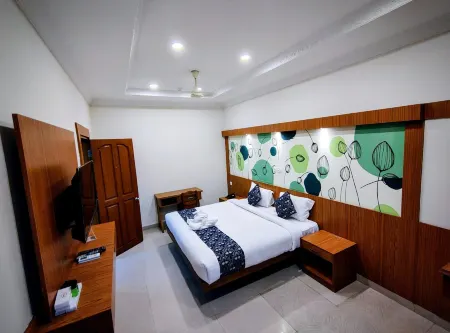 Sneha Inn Отели рядом с достопримечательностью «Uchatthu Kayam Riverside Picnic Spot»