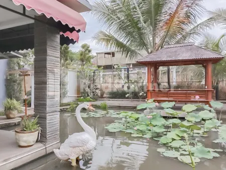 Khayrizsan Guest House Mitra RedDoorz Отели рядом с достопримечательностью «Teknik Informatika»