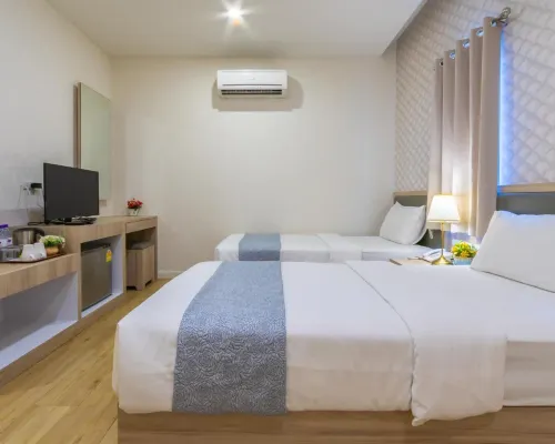 Deluxe Twin Room at Leela Orchid Hotel
