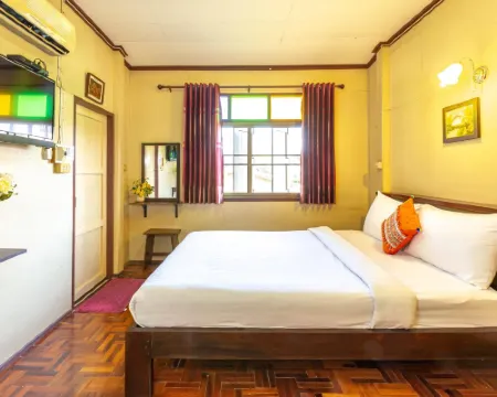 บ้านไม้หอม เกสท์เฮาส์ โรงแรมในอำเภอ แม่จัน