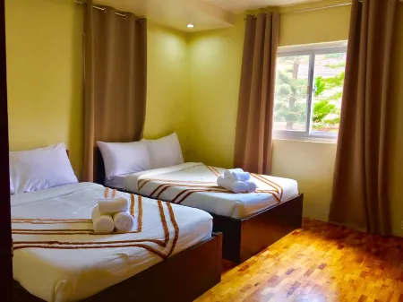 Elliannah Pines Hotel Отели в г. Туба