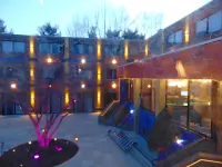 The Golfers Inn Hotels near Cobbs Creek Golf Club