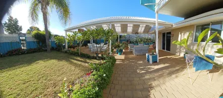 Palm Beach Guest House Отели в г. Рокингем