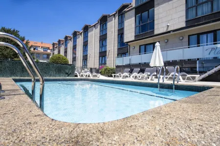 Hotel Alda Carril Отели рядом с достопримечательностью «Epsilon»