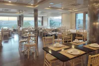 Hotel Sercotel Cuatro Postes - breakfast