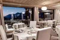 Hôtel Alpina & Spa - Restaurant Oxalis Hotels in Les Gets