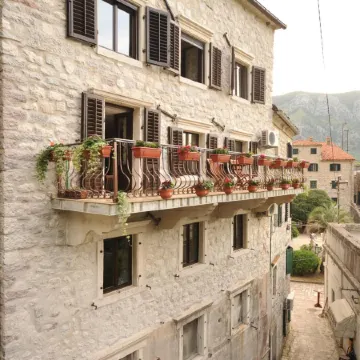 Una Apartments Отели в г. Котор