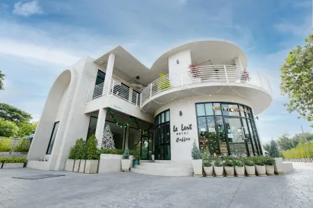 Le Lert Hotel Ratchaburi Отели рядом с достопримечательностью «Wat Chong Lom»