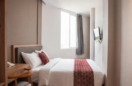 Grand Caman Hotel Отели в г. Pondok Gede