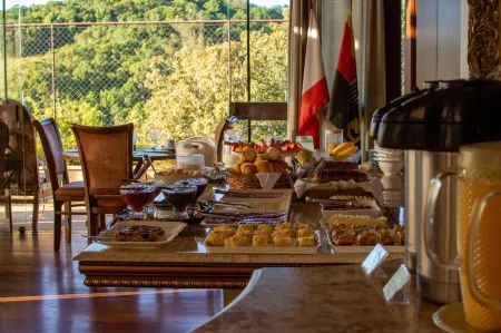 Casa Branca Pousada Отели рядом с достопримечательностью «Vila Encantada»