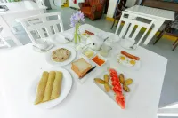 Hotel Vacanza - Desayuno