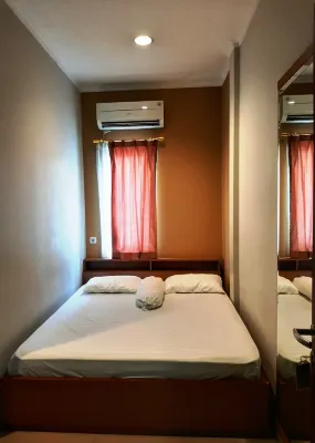 Kuningan Village Studio Syariah Hotel a 